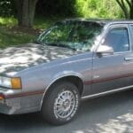 1985-1988 Cadillac Cimarron 2.8 photographed in Gaithersburg, Maryland, USA.