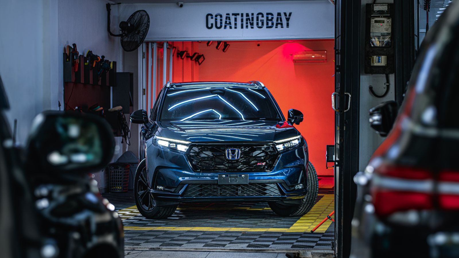 Blue Honda CR-V RS parked at the workshop