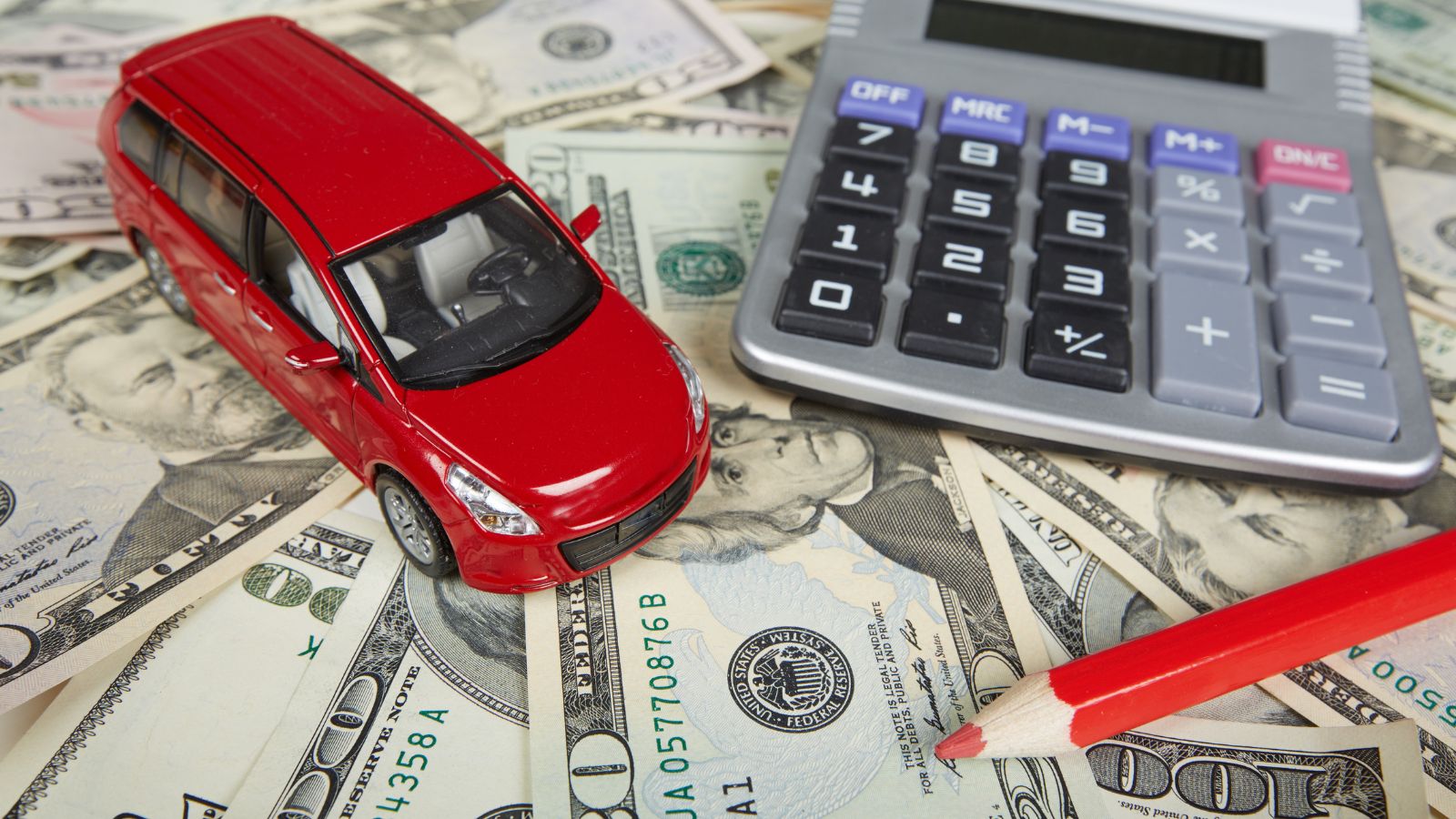 Car money and calculator. Payments and costs