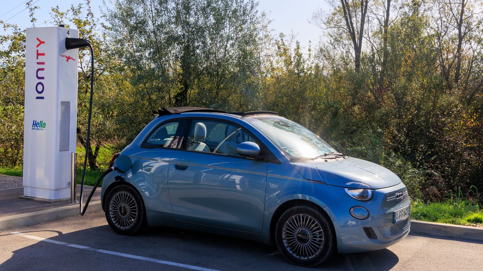 Fiat 500 electric convertible at a fast charging station