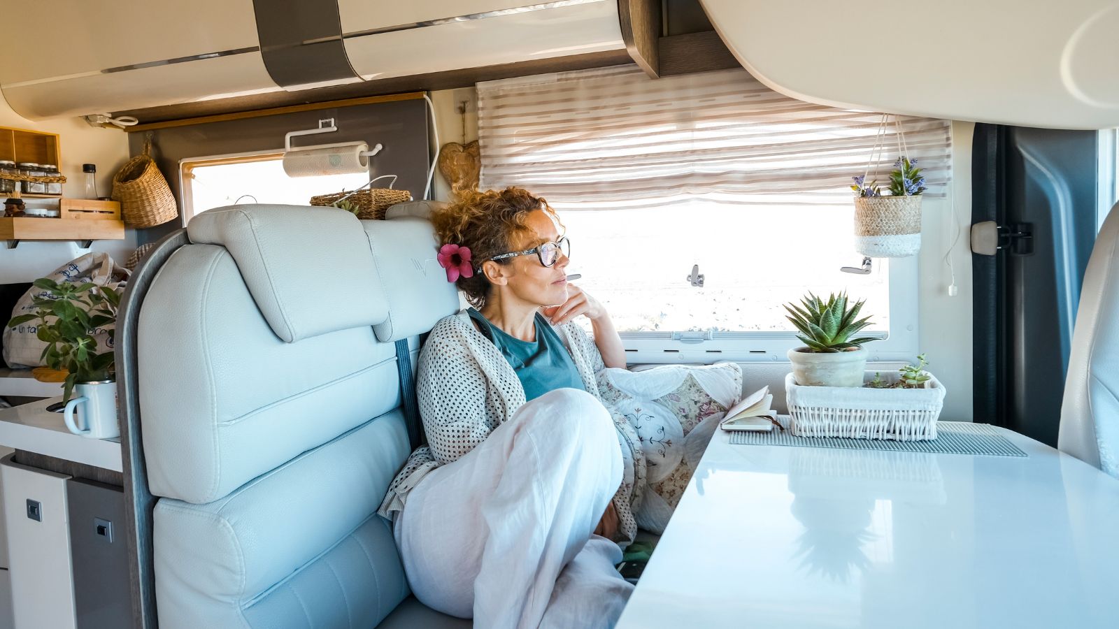  Interior of rv vehicle and lady having relax serene