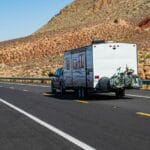 Mohave desert by Route 66. RV Camping, Camper Van on road