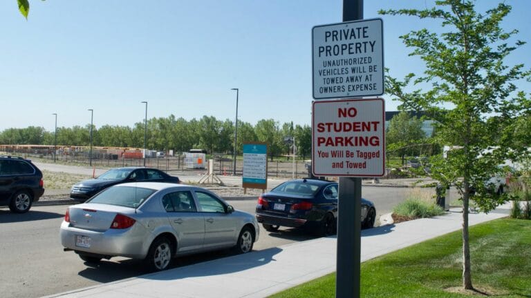 Calgary, Alberta / Canada - July 30, 2019. No Student Parking - You will be Tagged and Towed - Currie Barracks Neghbourhood by Mount Royal University in Calgary, Alberta, Canada.