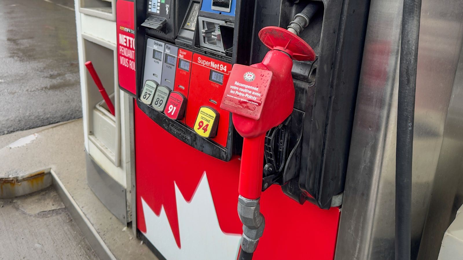 Montreal, Canada - 31 March, 2025: Close-up of a Petro-Canada gas pump, showing various fuel options.