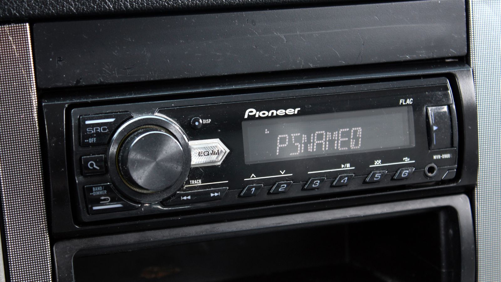 Vintage Pioneer Cassette Recorder in a Car. Pioneer Car Audio. Old Pioneer cassette car stereo