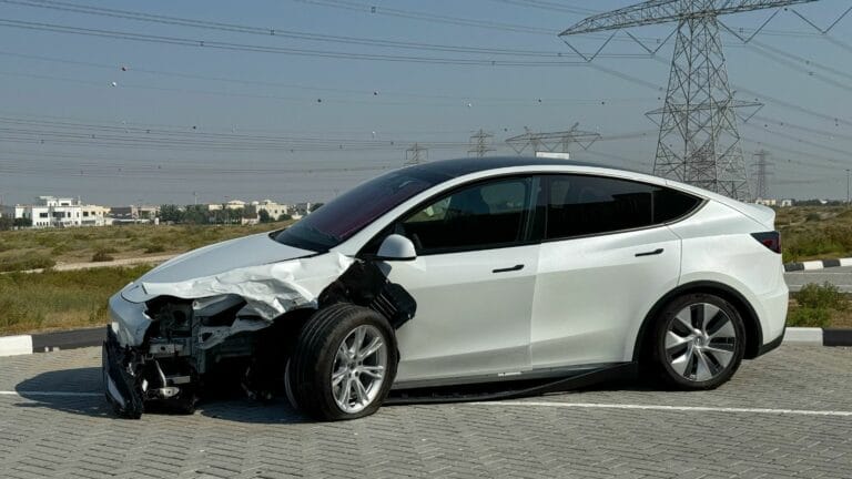 a damaged Tesla, EV accident