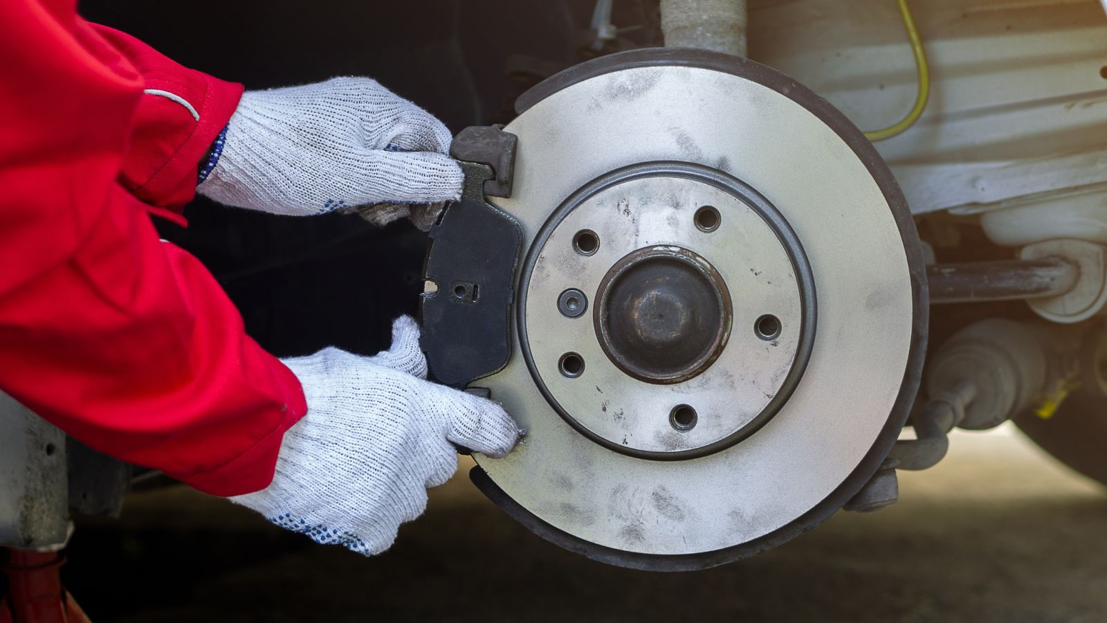 Process of replacing brake pads with Brand new. Auto mechanic repairing in garage Car brakes. Car Maintenance checklist