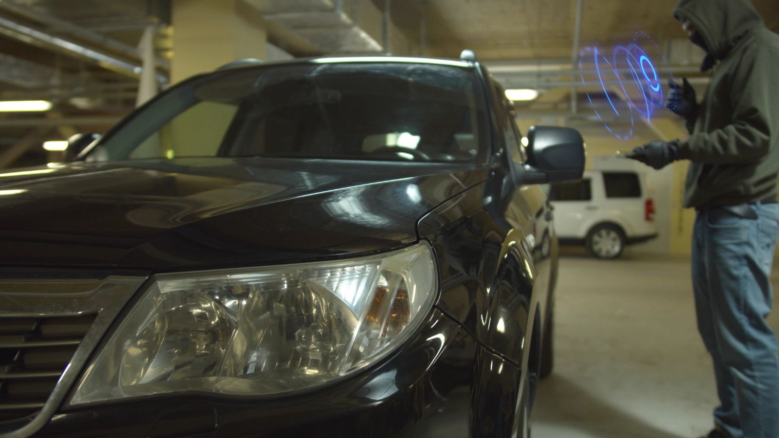 car cracker open the door of car at parking using technology with virtual reality