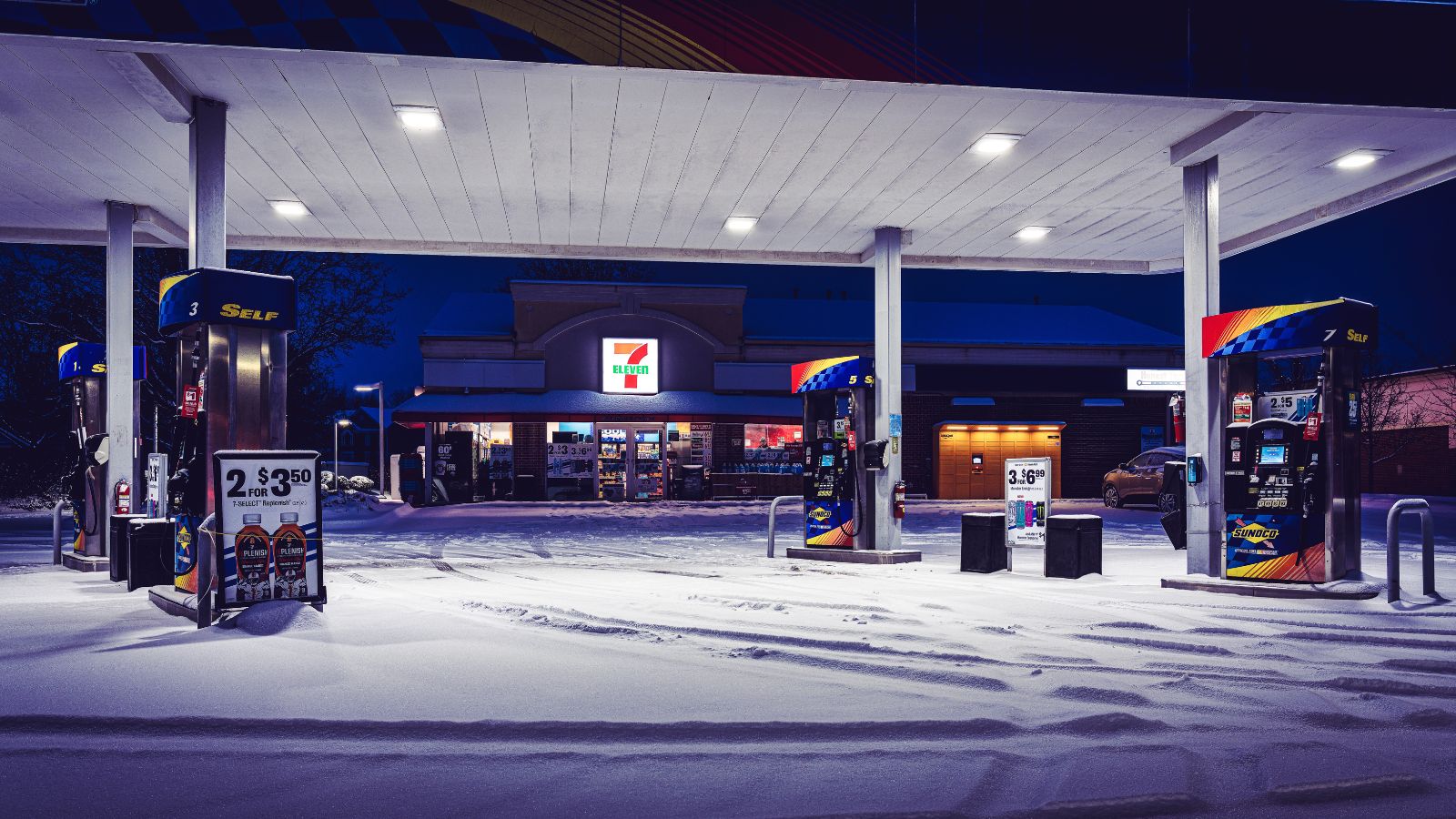 gas station at night in the snow