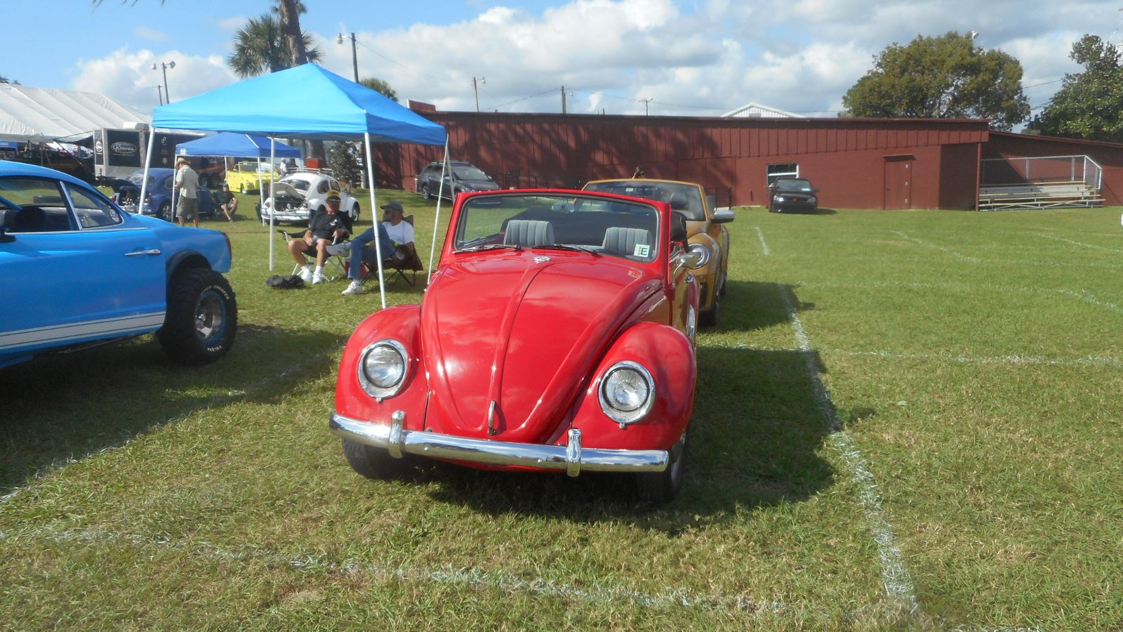 mid-1960's red Volkswagen Beetle convertible