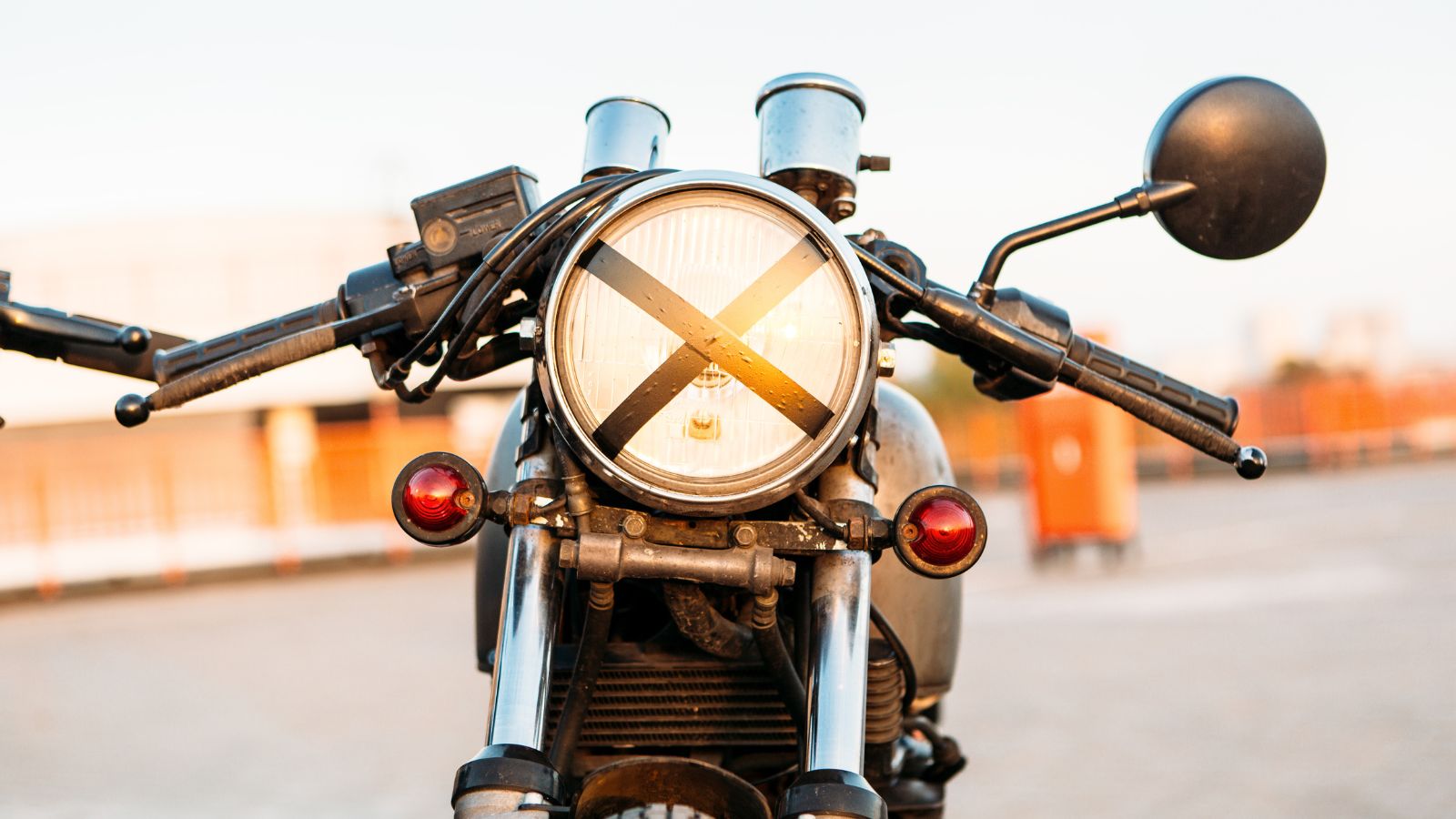 motorbike with tape cross over headlight