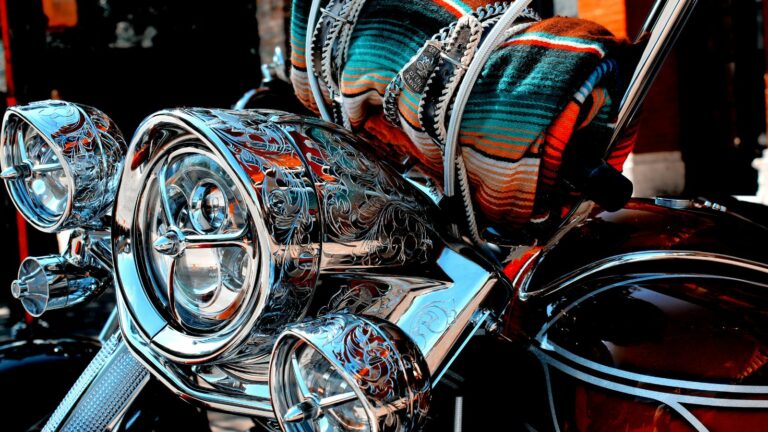 Custom colorful motorcycle with chrome headlights and wrapped up blanket