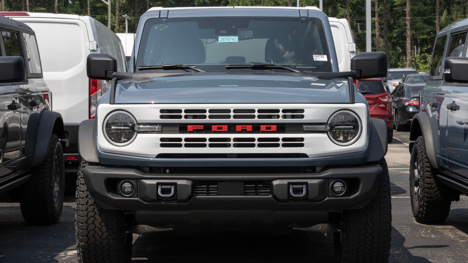 Ford Bronco Heritage 4X4 off road SUV display at a dealership. Ford offers the Bronco with a 2.7L EcoBoost V6 engine. MY2025