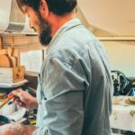 Man cooking in RV