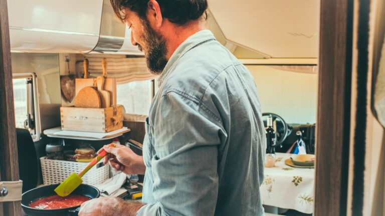 Man cooking in RV