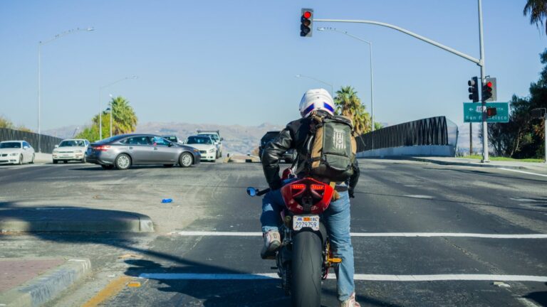 Motorcyclist waiting at a traffic light