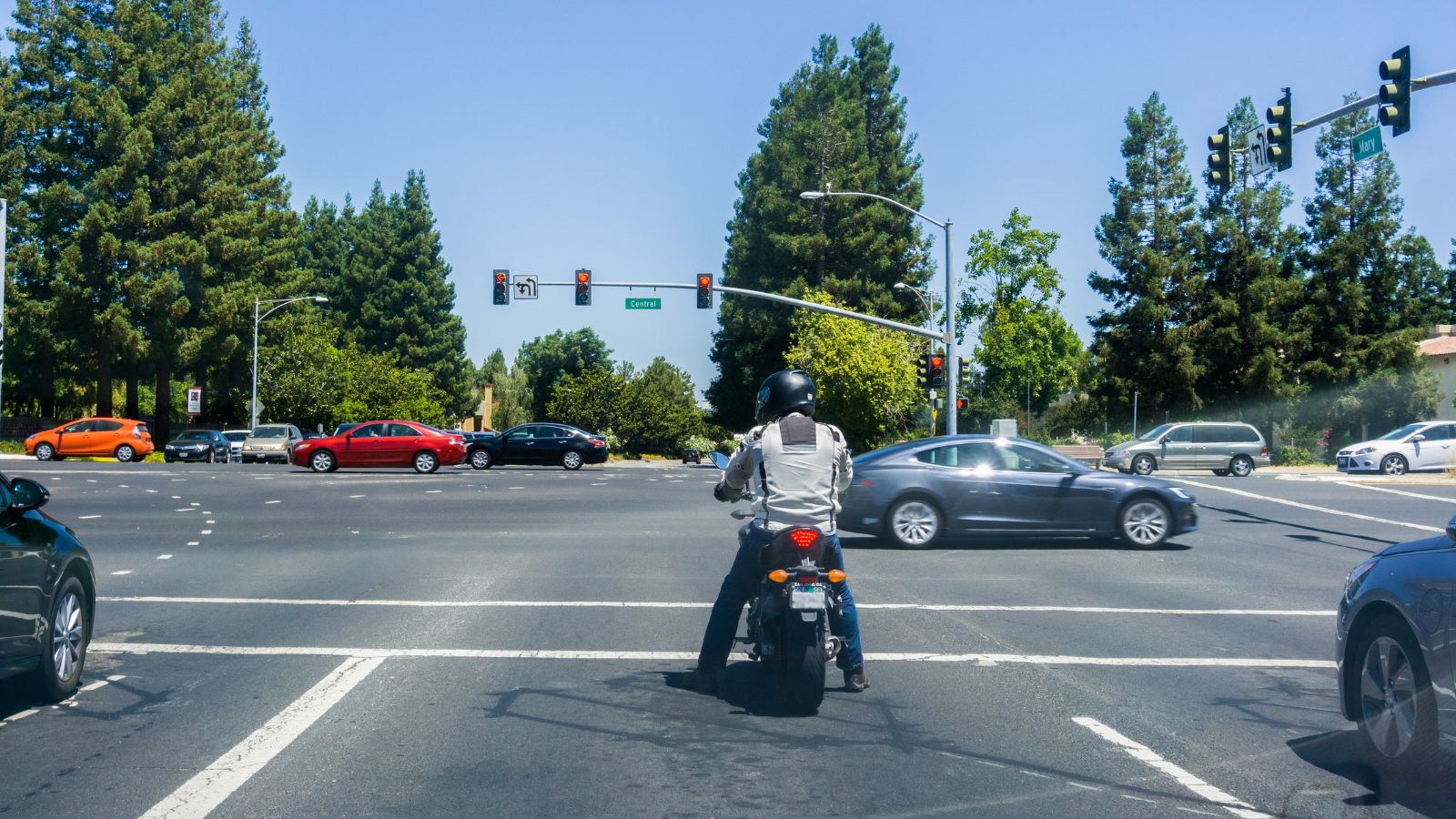 Motorcyclist waiting at a traffic light