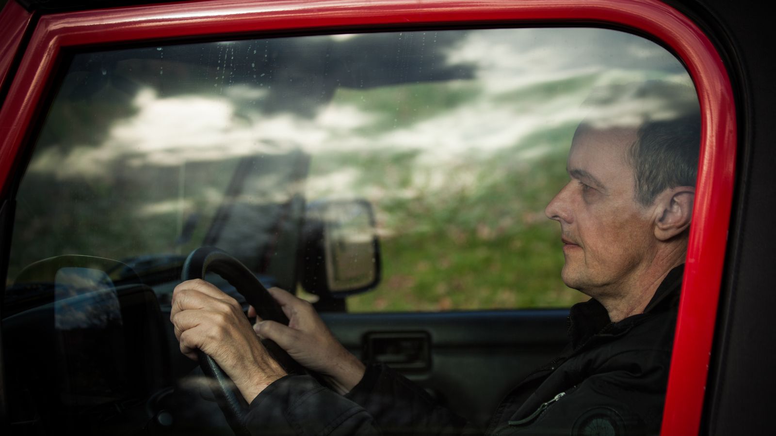 Older man drive car