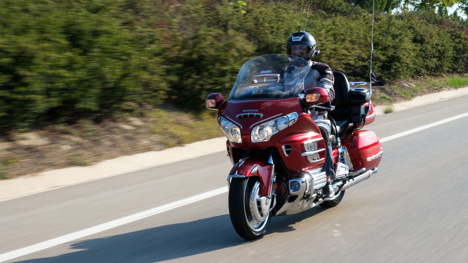 people riding their big motorcycles in the streets