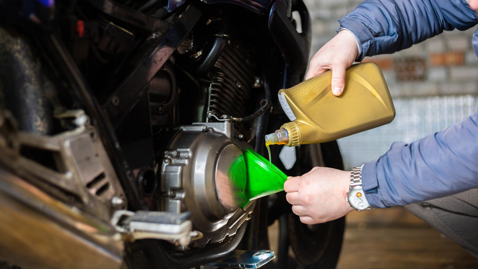 pouring new engine oil