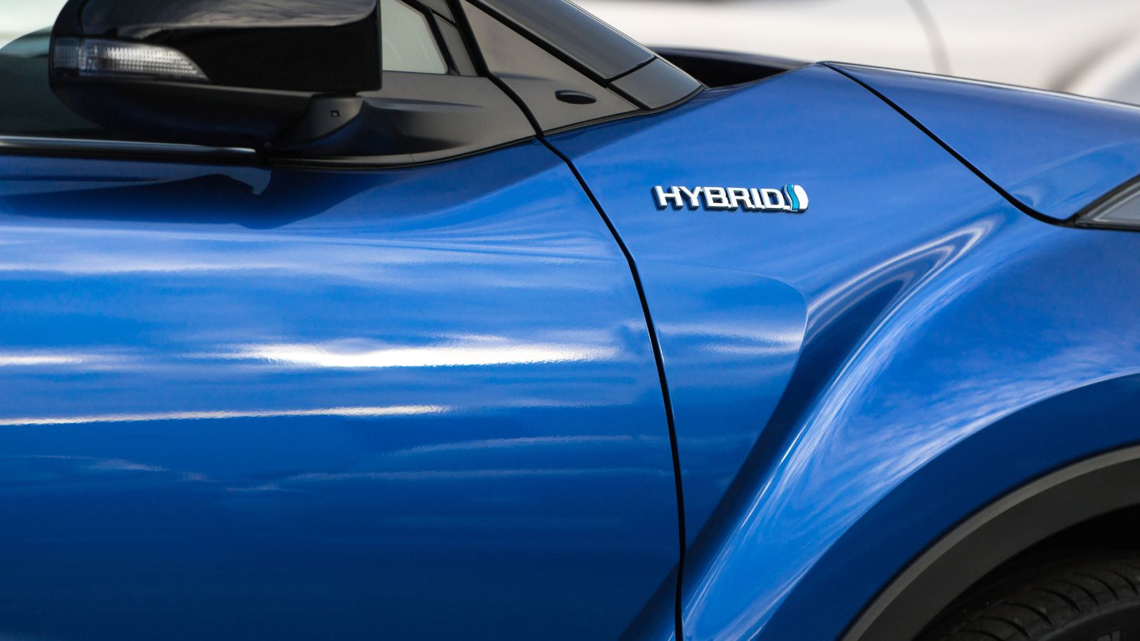 toyota hybrid car sign